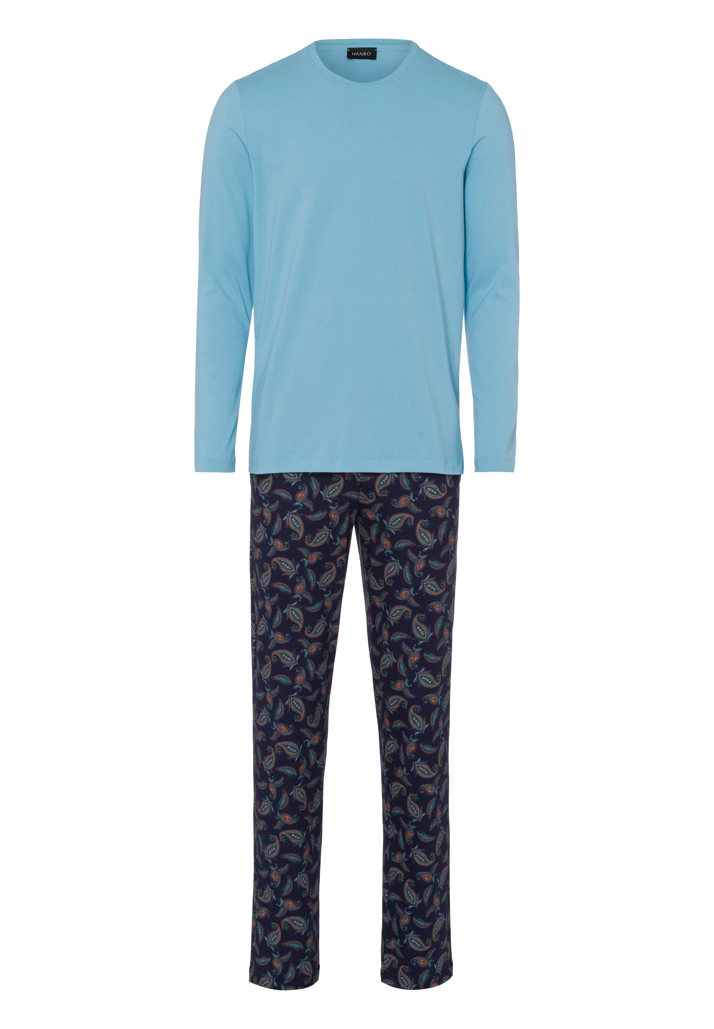 Light blue long-sleeve top and dark patterned pants on a white background