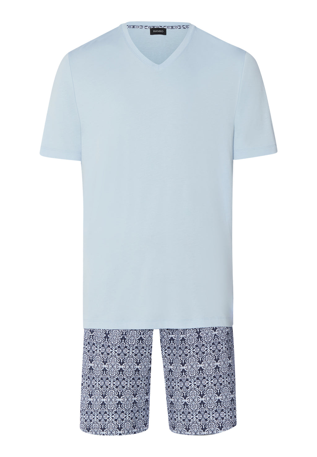 Light blue pajama set with floral shorts on a white background