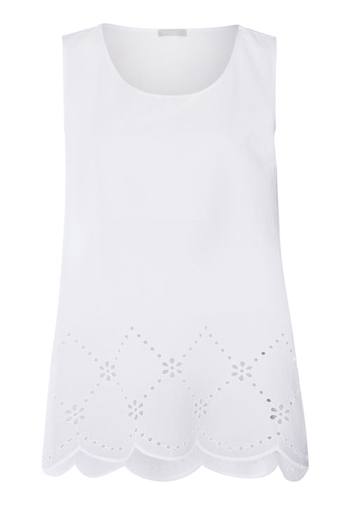 White sleeveless top with scalloped hem on a white background