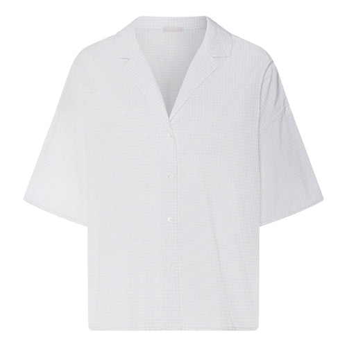 White blouse with a V-neck on a white background